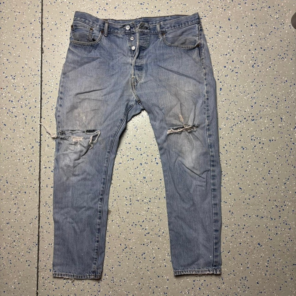 Vintage Levi's 501 button fly faded distressed light blue ripped tag size 38x29